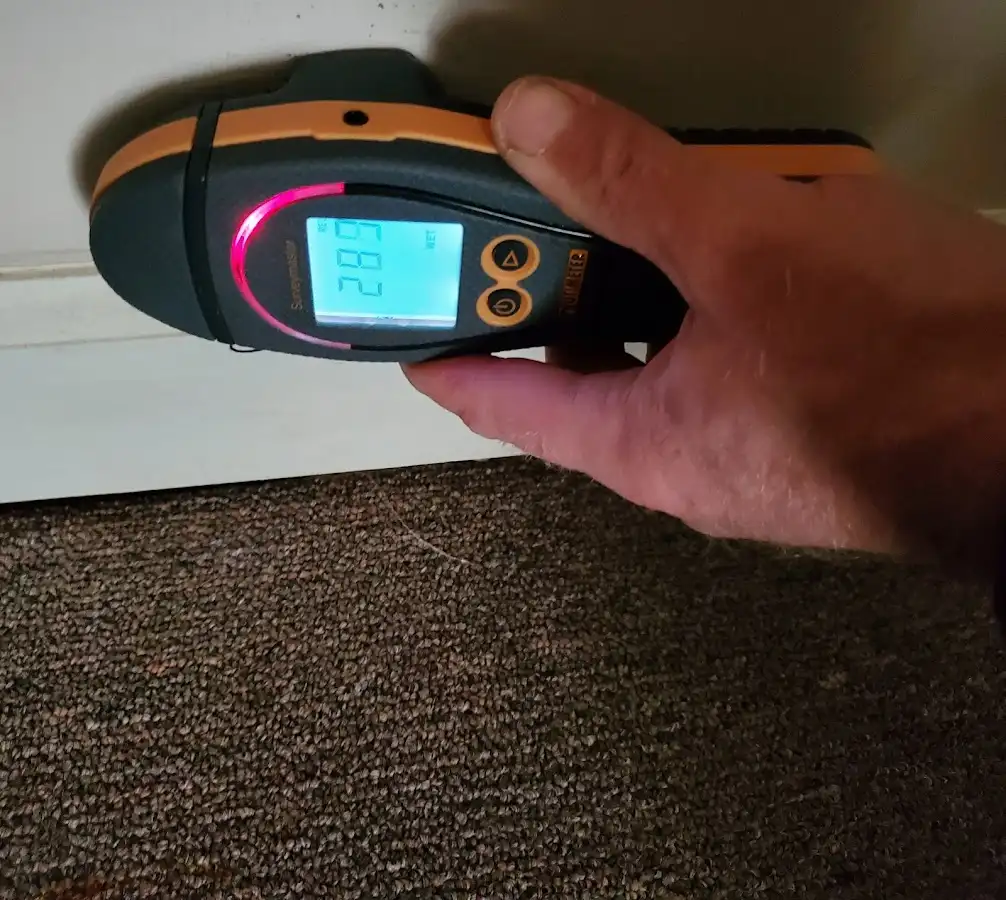 Moisture detection at baseboard during Storm Damage Restoration in Wahiawa